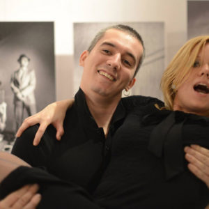 Tijana Kondic with a man on a photo exhibition